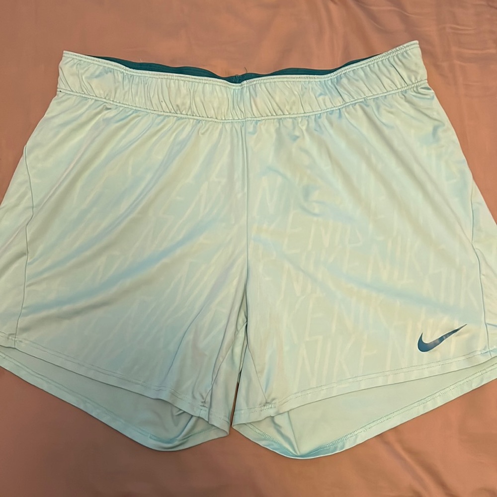 Nike shorts. Womens size Large. Blue/teal. Lightly worn.